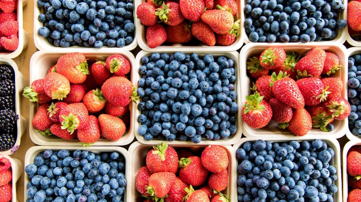 baskets of fresh blueberries and strawberries