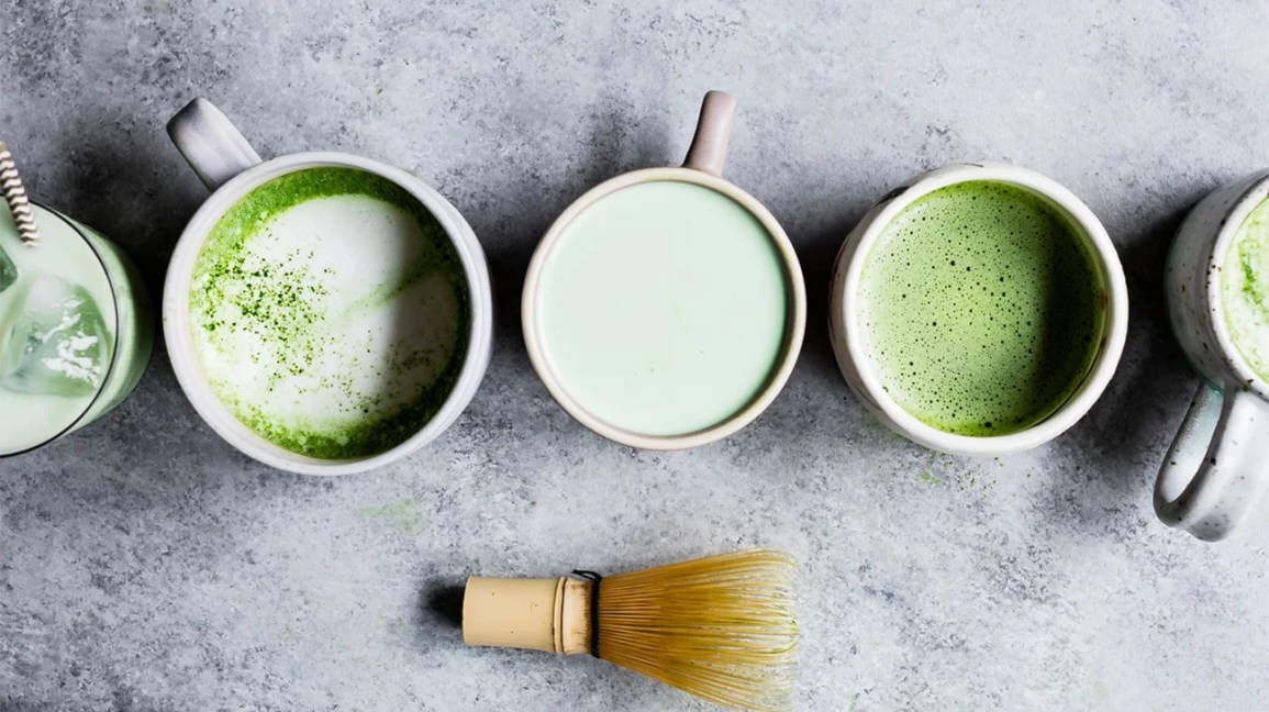 several mugs of matcha tea